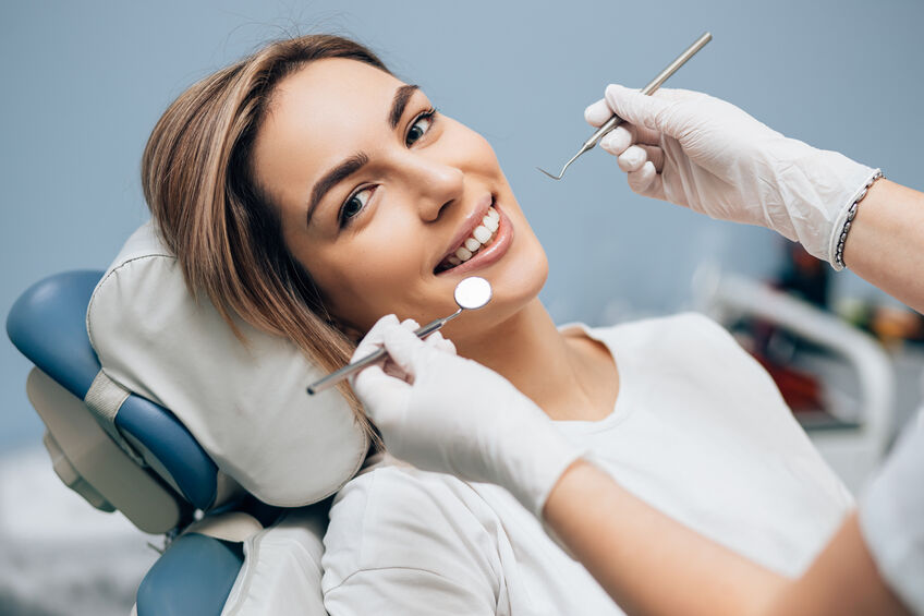 Woman In a Dentist's Chair Smiling